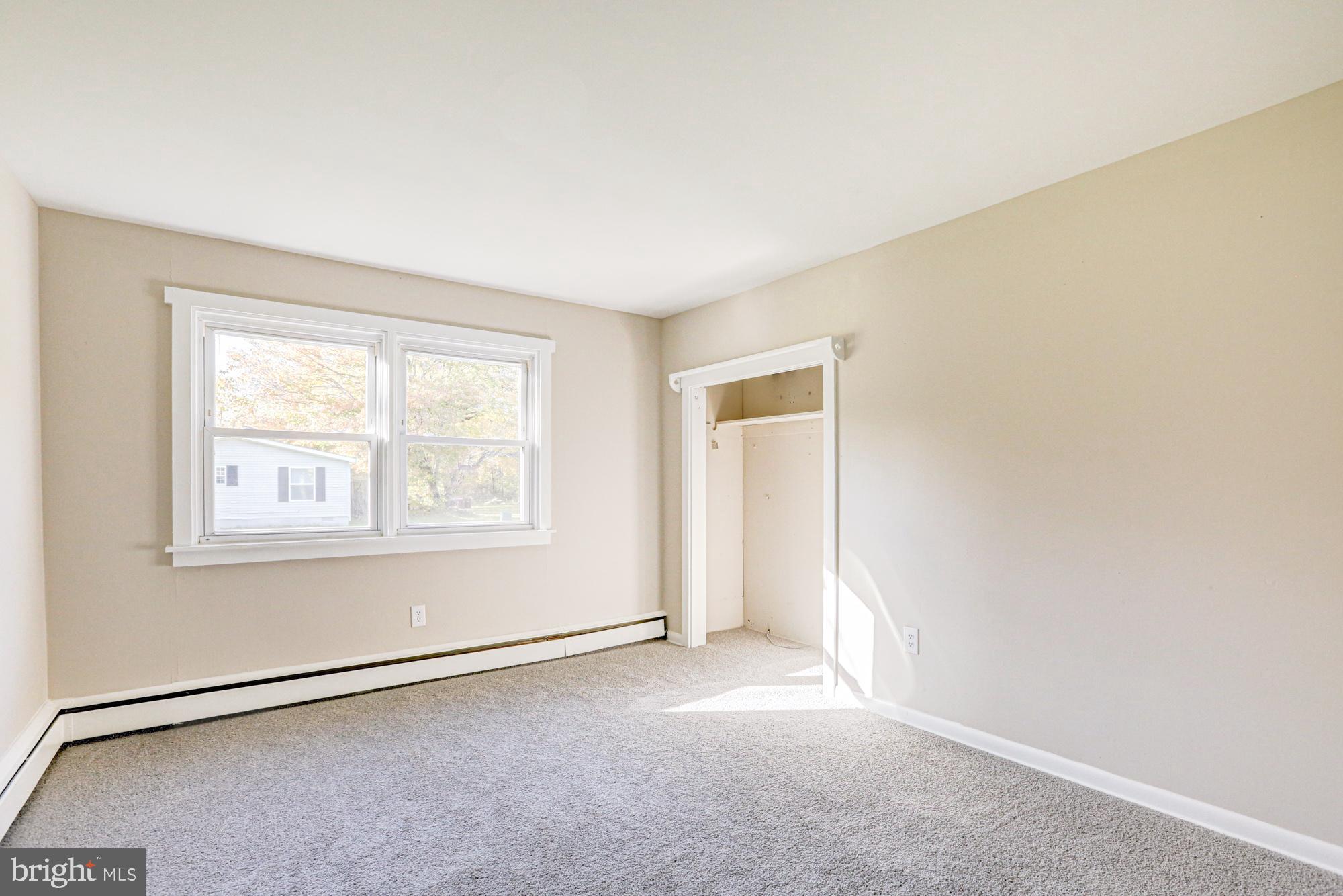 4841 Sandtown Road Felton, DE 19943 - Photo 31 of 70 an empty room with windows