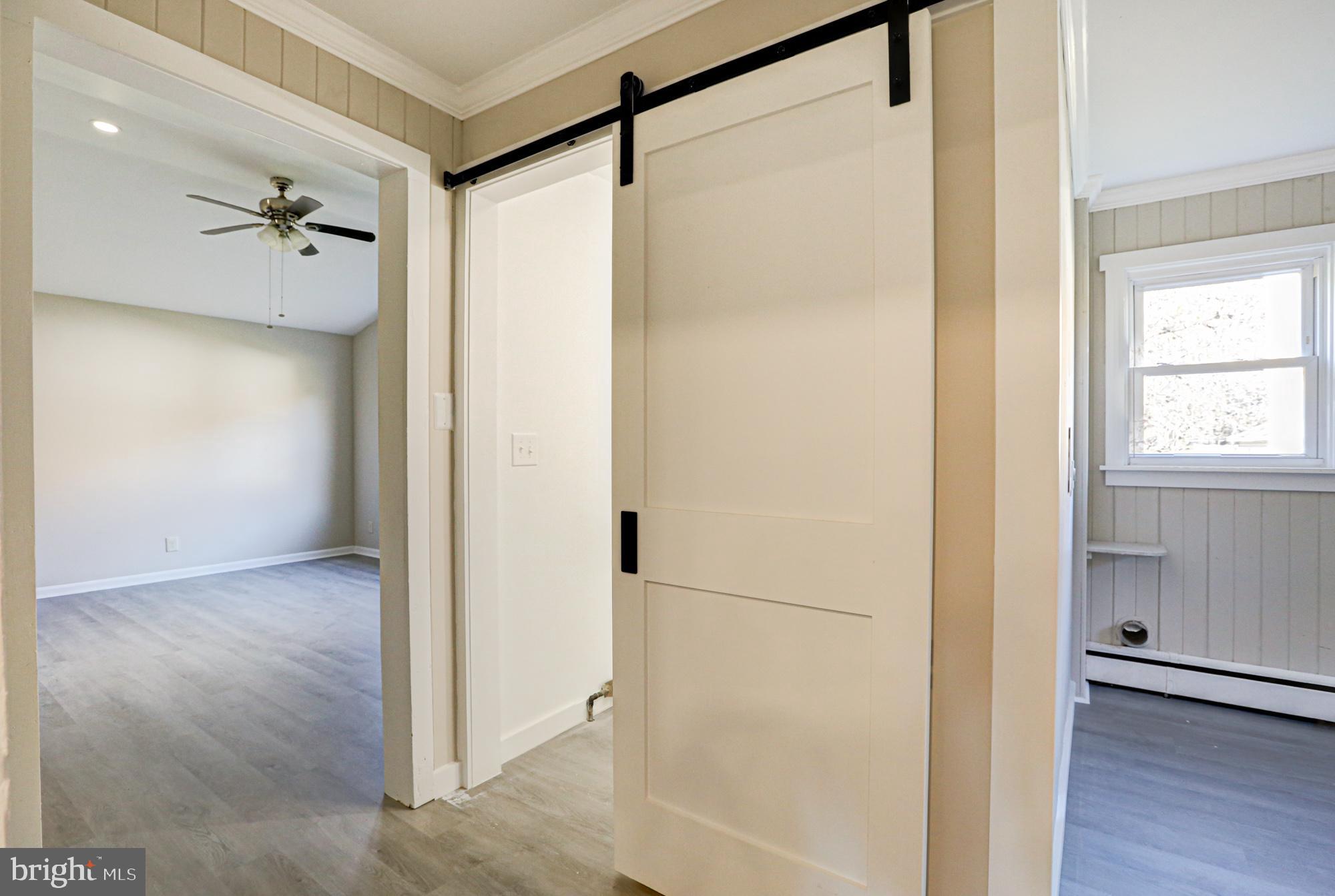 4841 Sandtown Road Felton, DE 19943 - Photo 34 of 70 a view of a bathroom with a glass shower door