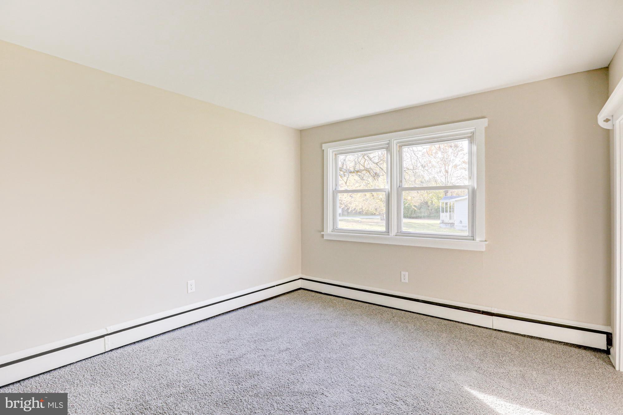 4841 Sandtown Road Felton, DE 19943 - Photo 41 of 70 an empty room with a window