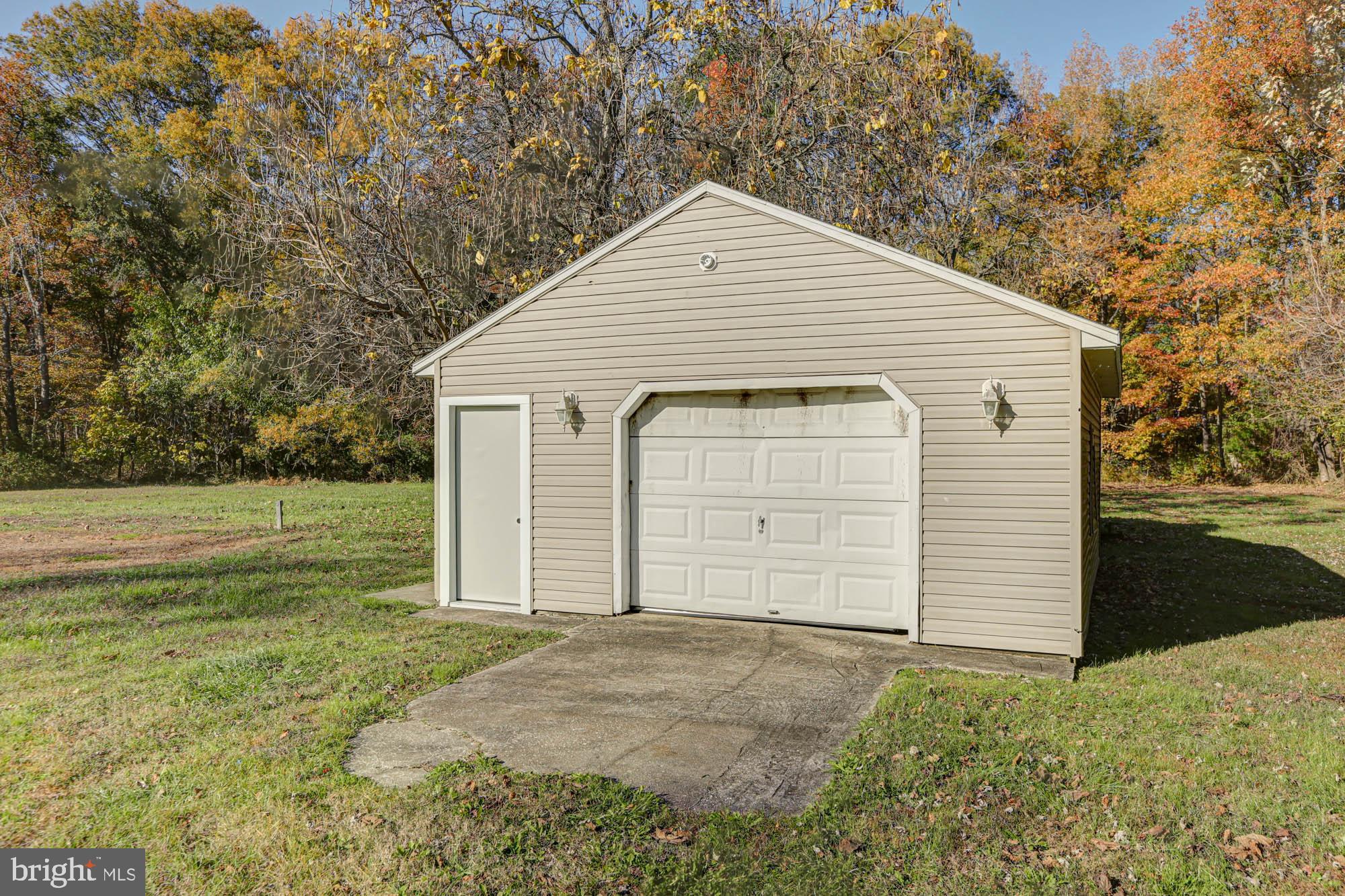 4841 Sandtown Road Felton, DE 19943 - Photo 62 of 70 a front view of a house with a yard