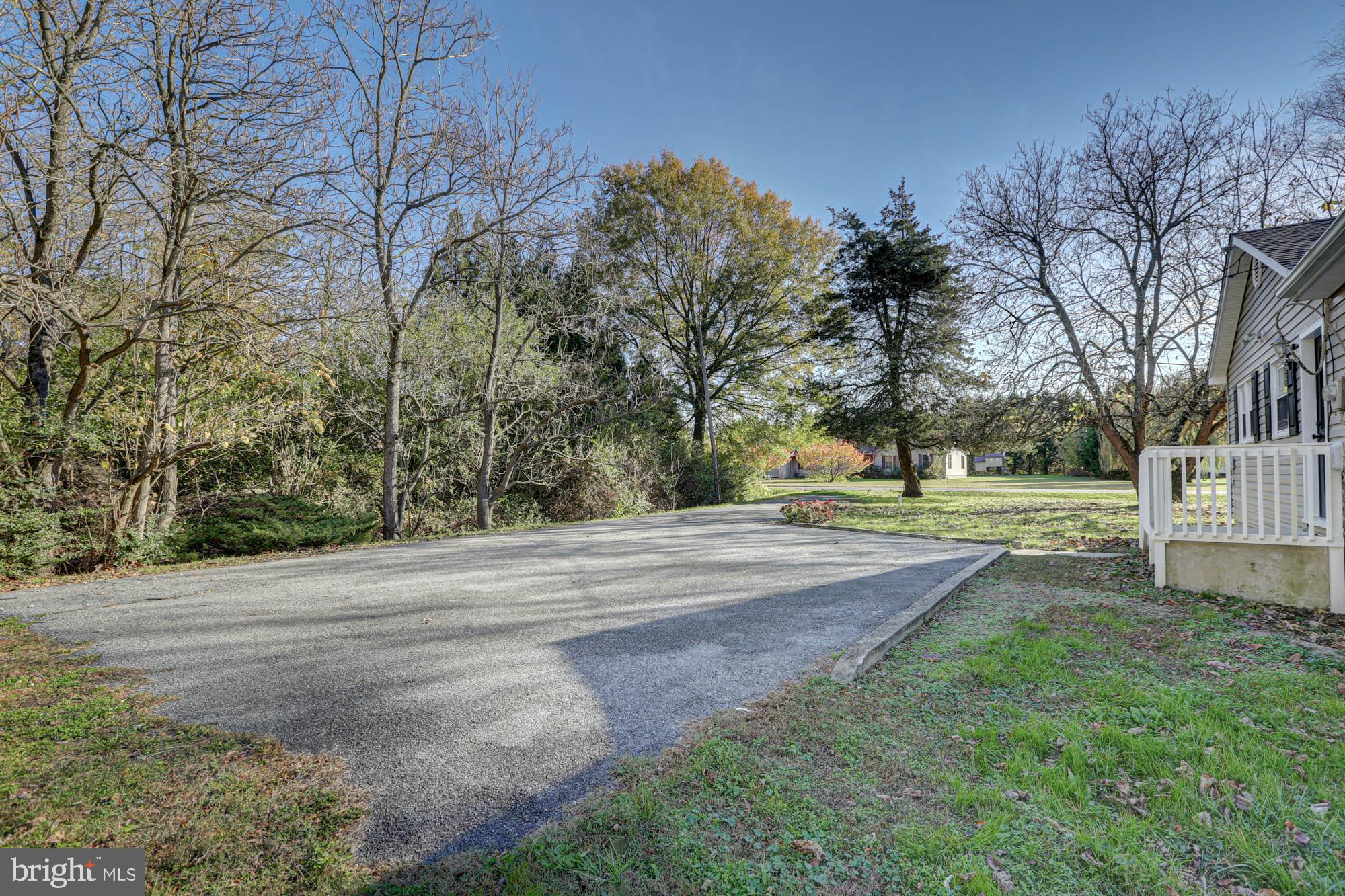 4841 Sandtown Road Felton, DE 19943 - Photo 66 of 70 Spacious driveway amidst serene greenery.