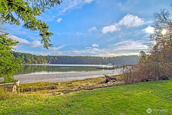 a view of a lake with a big yard
