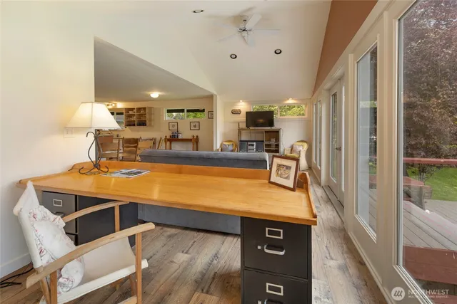 a bedroom with a bed and a table