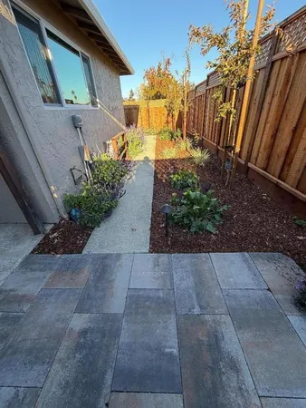 a backyard of a house with lots of green space