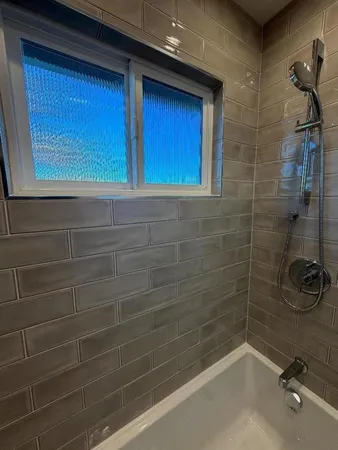 a bathroom with a bathtub