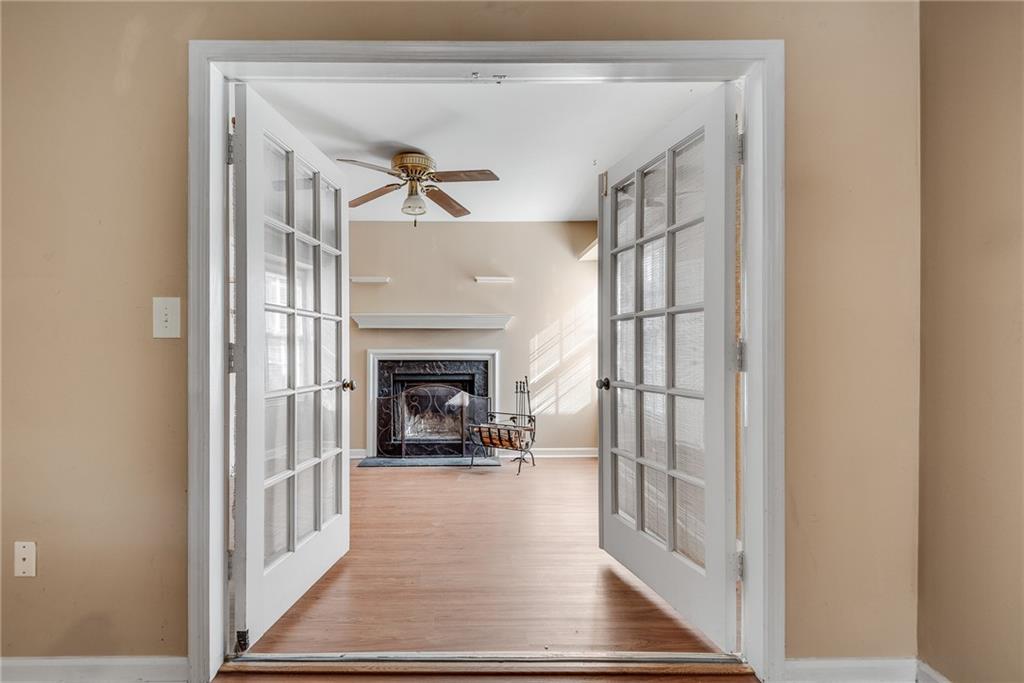 a view of a livingroom with a fireplace and furniture