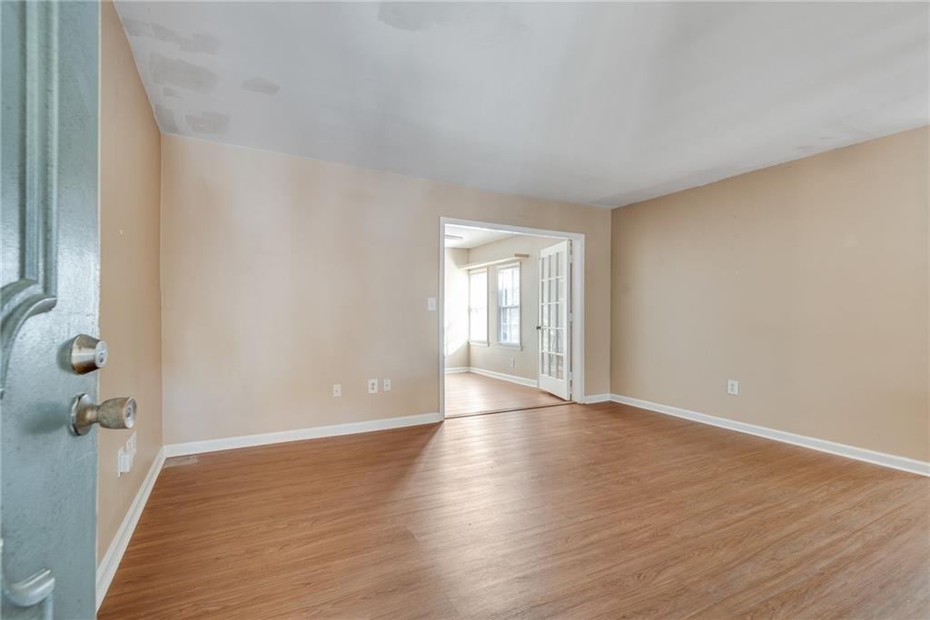 134 Lablanc Way Northwest Atlanta, GA 30327 - Photo 4 of 42 a view of livingroom with hardwood floor and a ceiling fan