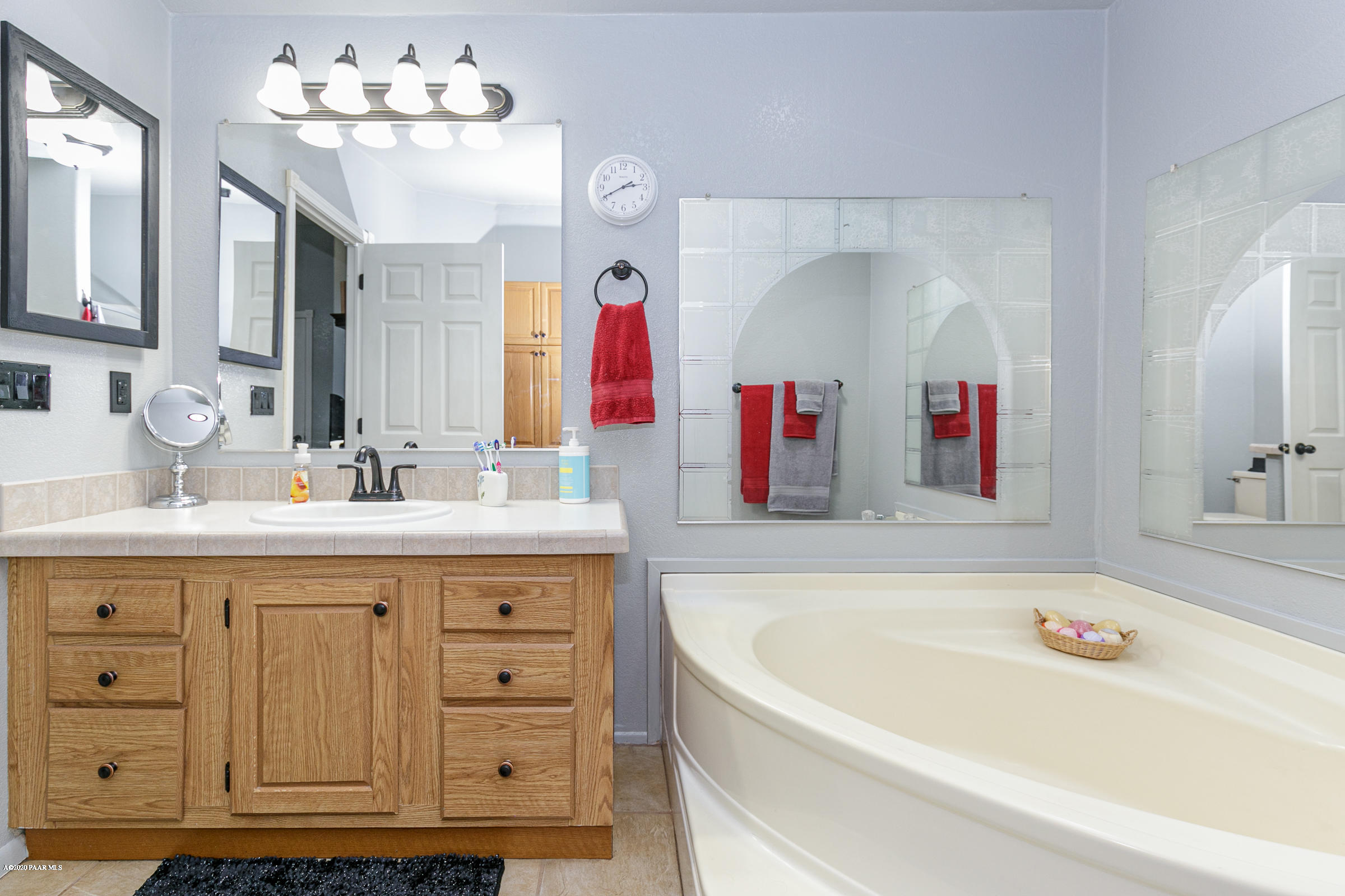 22355 North Docs Road Paulden, AZ 86334 - Photo 14 of 39 a bathroom with a tub sink and mirror