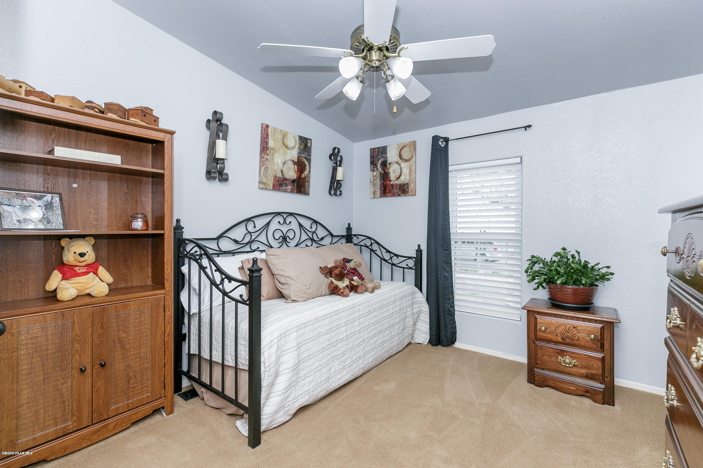 22355 North Docs Road Paulden, AZ 86334 - Photo 16 of 39 a view of a bedroom with furniture and staircase
