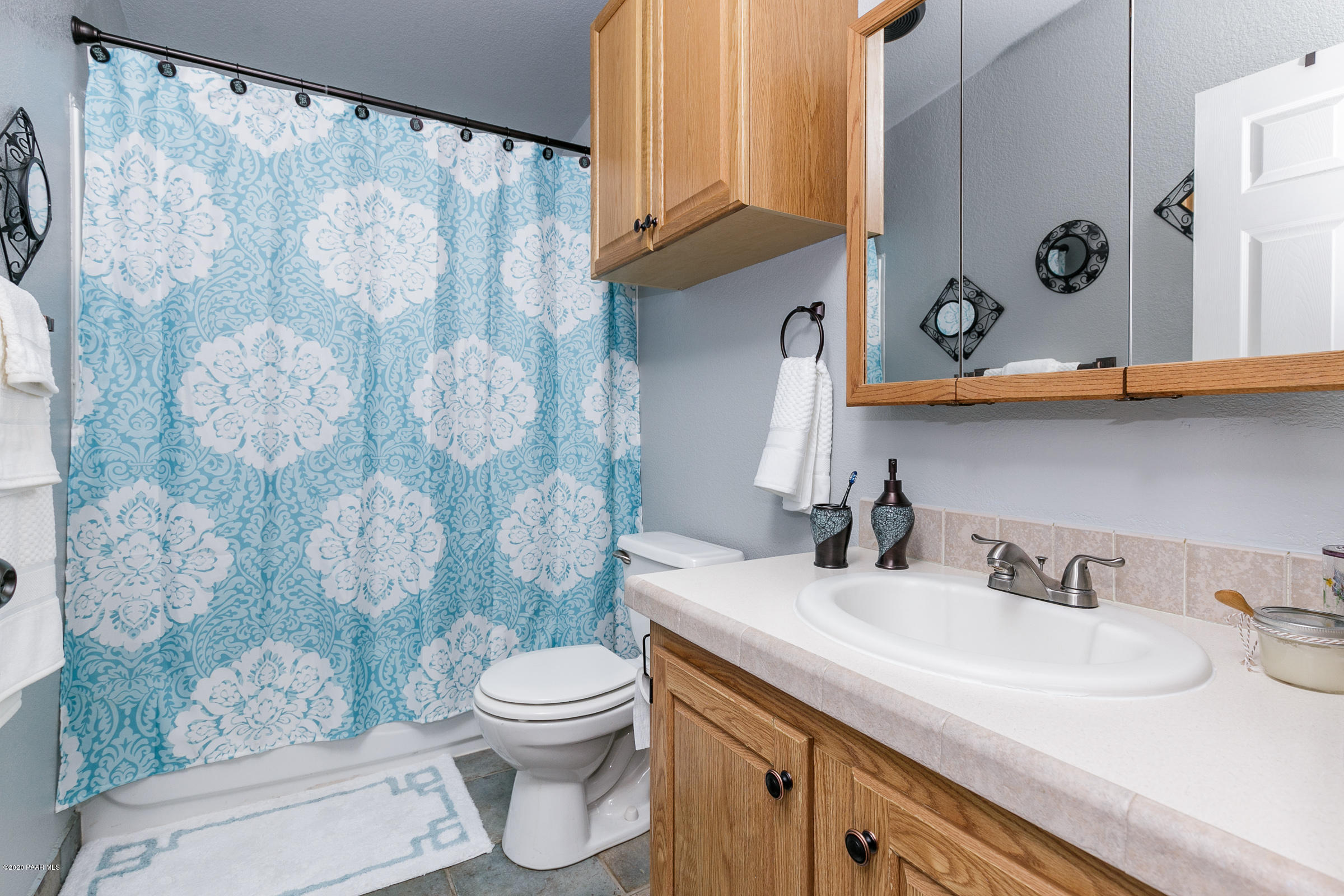 22355 North Docs Road Paulden, AZ 86334 - Photo 19 of 39 a bathroom with a sink toilet and shower