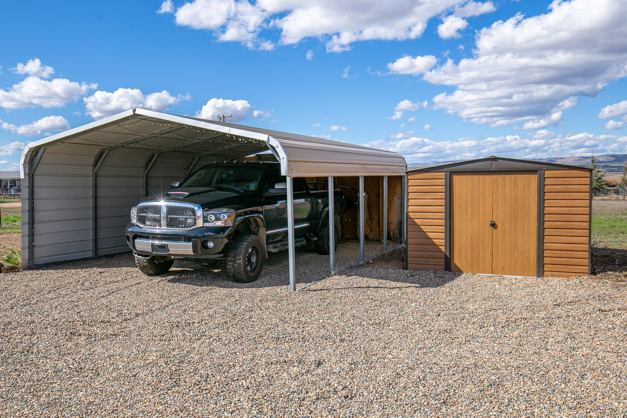 22355 North Docs Road Paulden, AZ 86334 - Photo 23 of 39 a view of a car in front of house