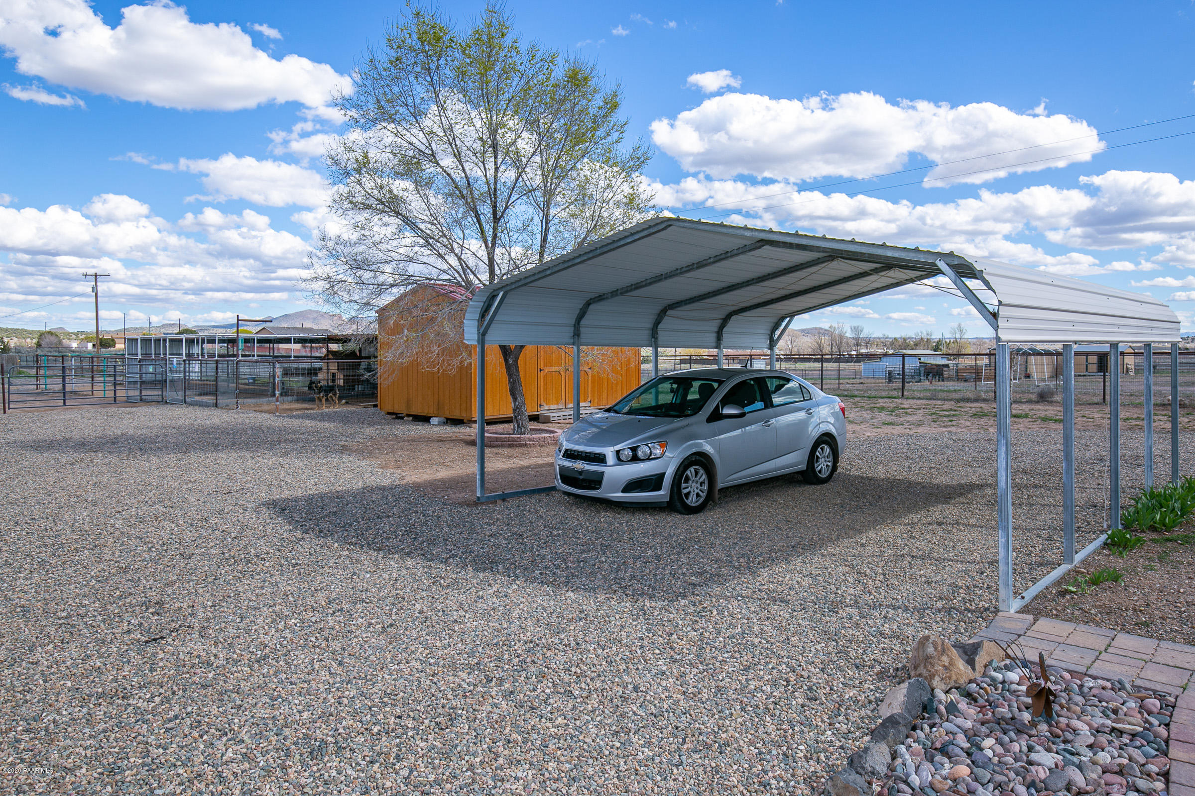 22355 North Docs Road Paulden, AZ 86334 - Photo 29 of 39 a car parked in front of a house