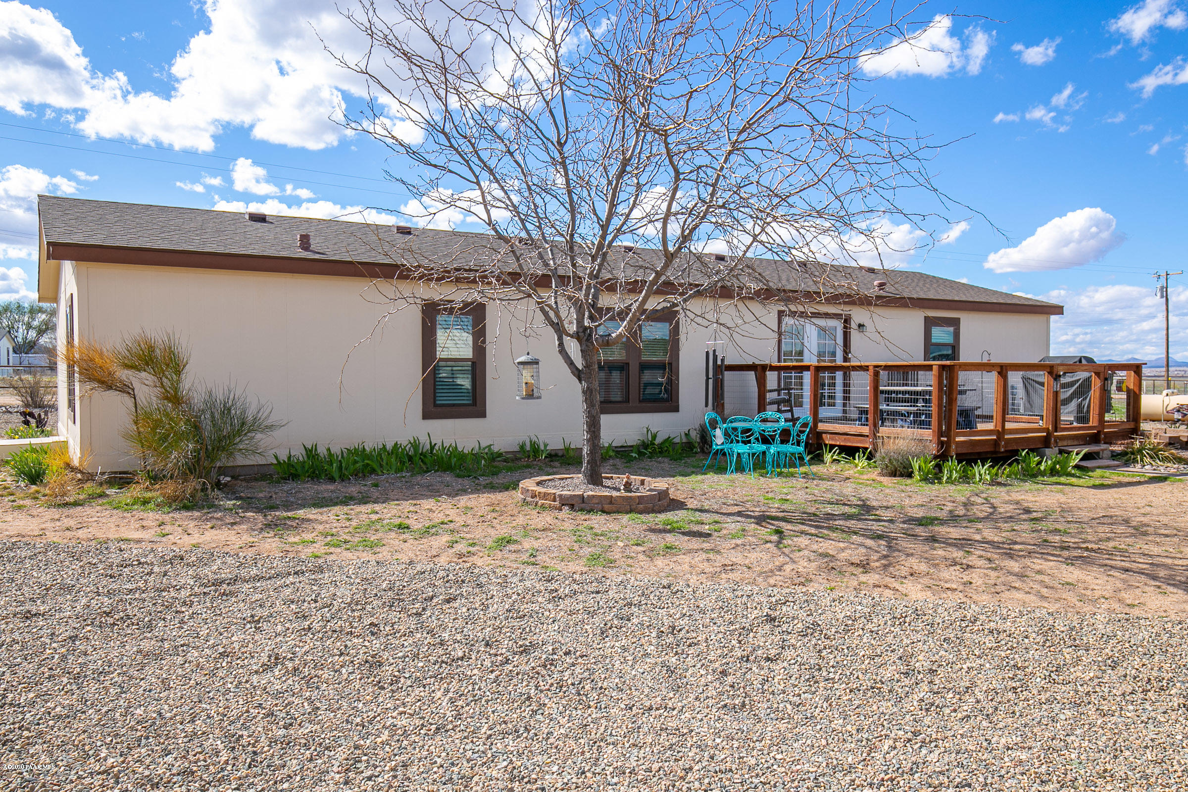 22355 North Docs Road Paulden, AZ 86334 - Photo 30 of 39 a front view of a house with a yard and garage