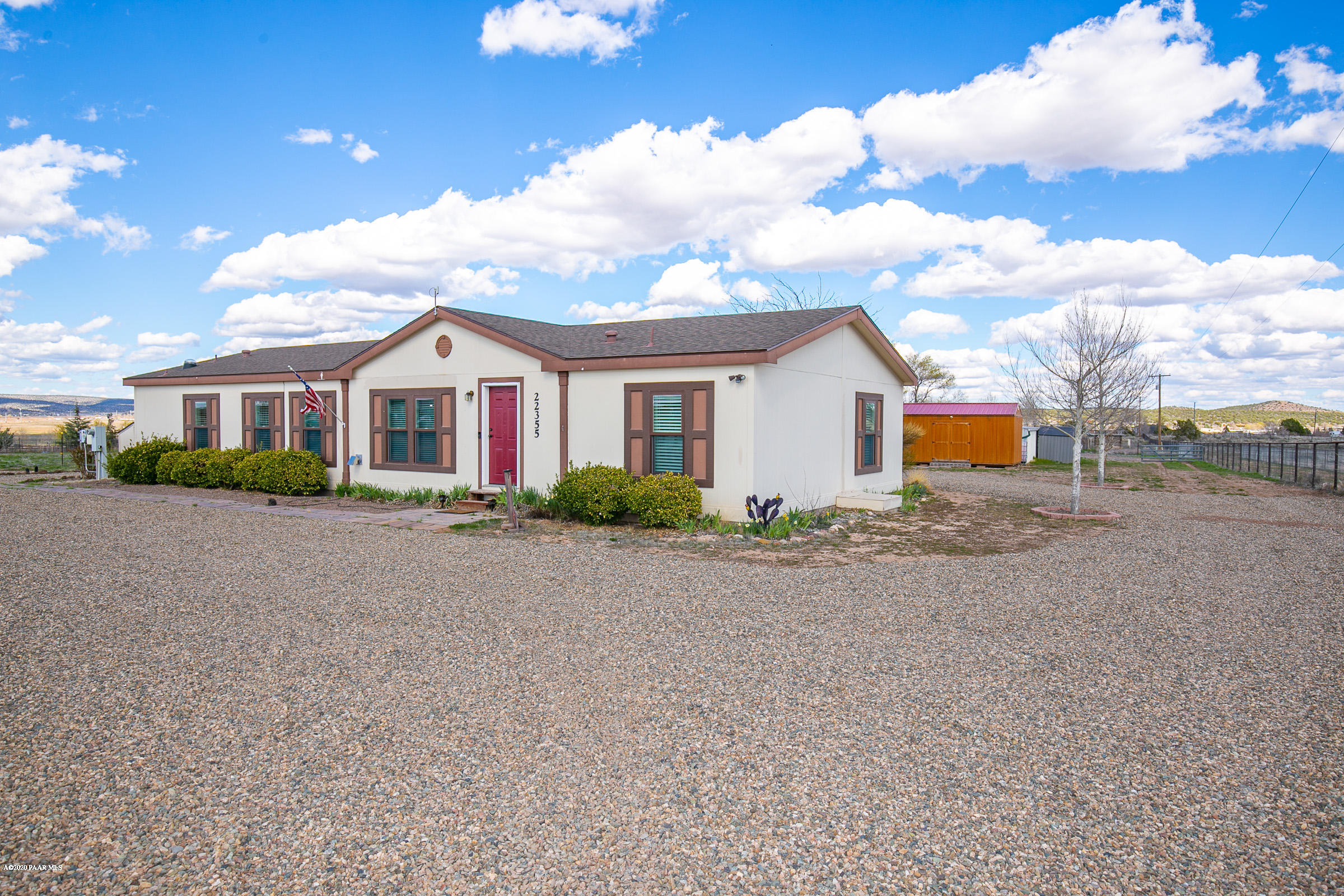 22355 North Docs Road Paulden, AZ 86334 - Photo 31 of 39 a view of a house next to a yard and road
