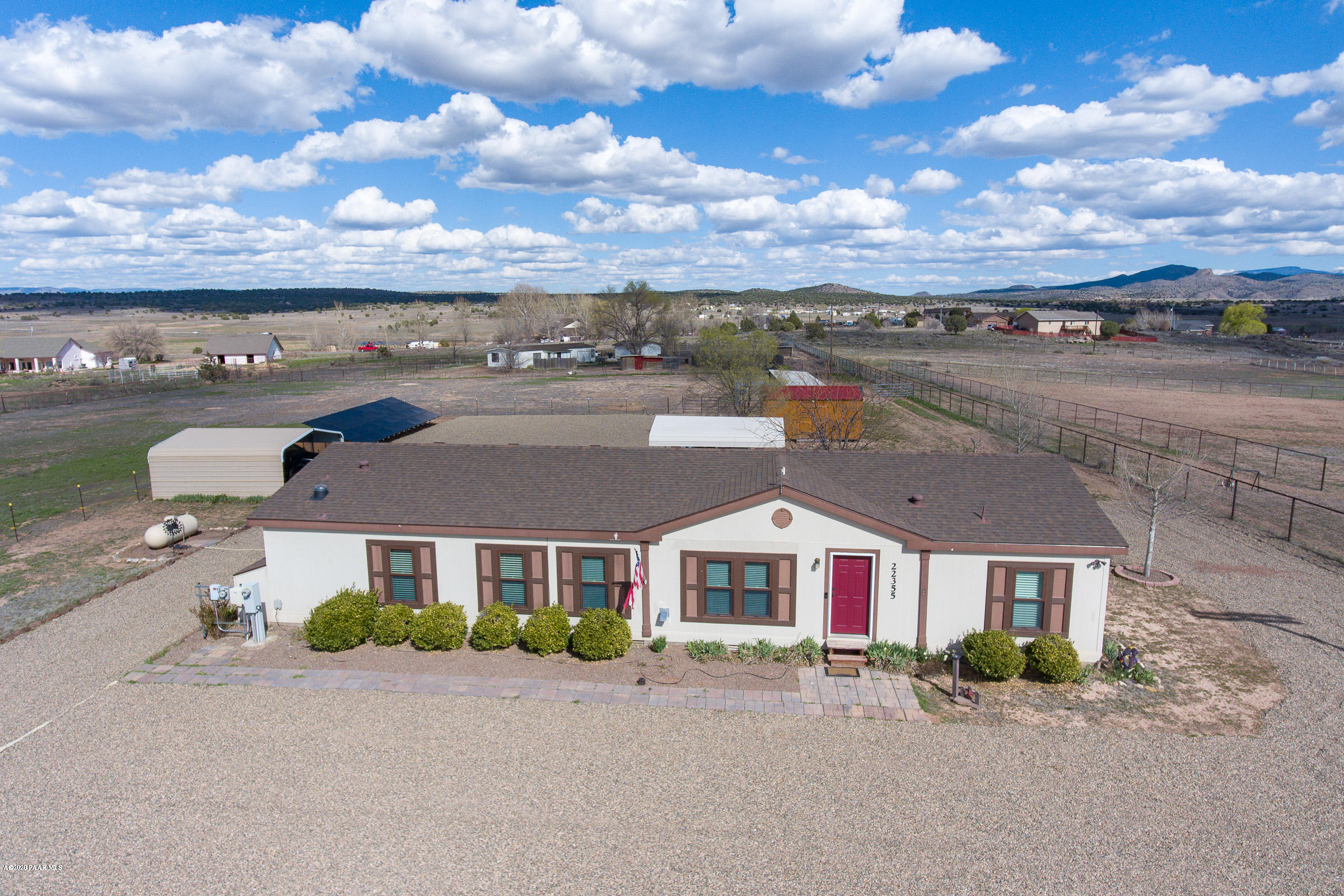 22355 North Docs Road Paulden, AZ 86334 - Photo 32 of 39 an aerial view of multiple houses with a yard