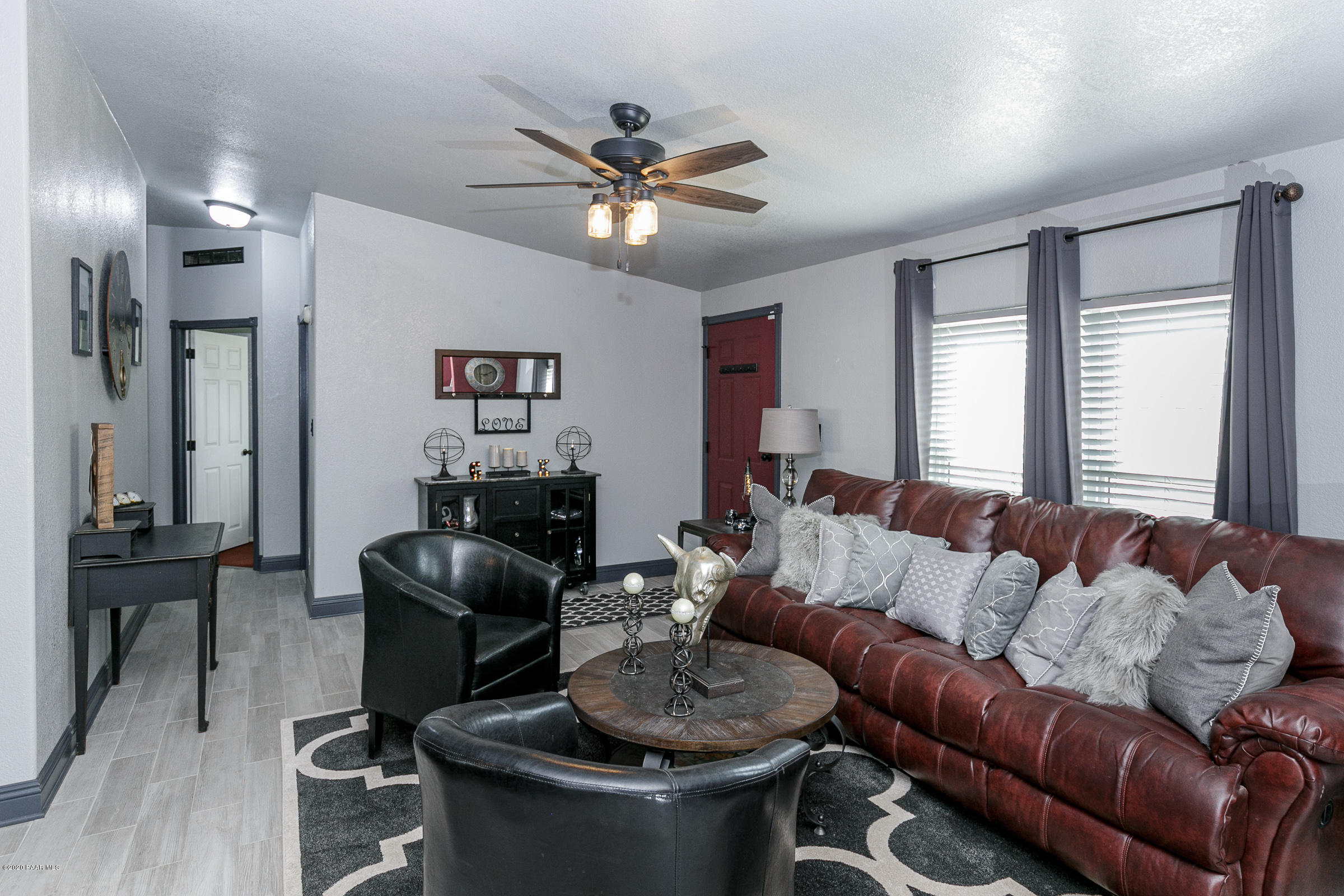 22355 North Docs Road Paulden, AZ 86334 - Photo 4 of 39 a living room with furniture and a large window