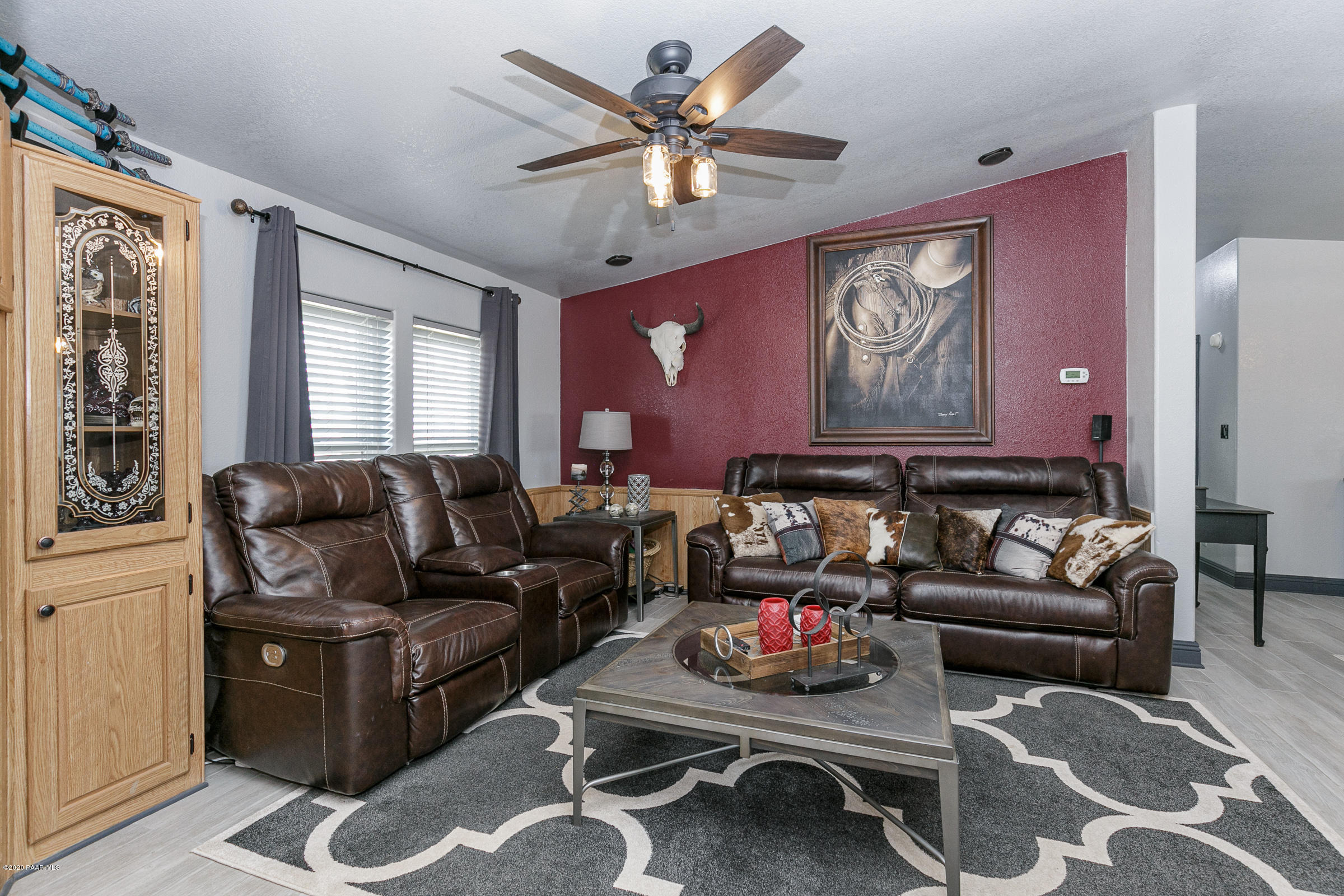 22355 North Docs Road Paulden, AZ 86334 - Photo 5 of 39 a living room with furniture ceiling fan and a window