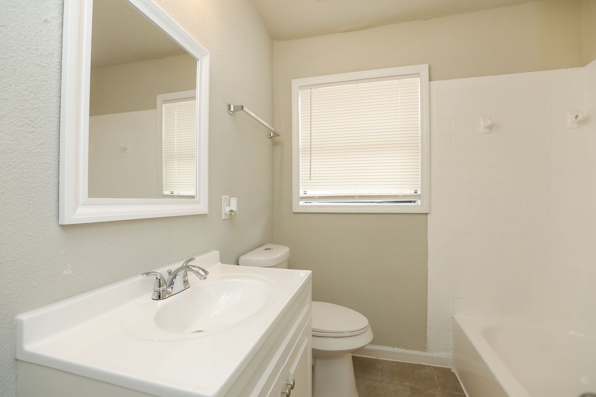 718 Champs Street Channelview, TX 77530 - Photo 26 of 31 a bathroom with a sink toilet and a mirror