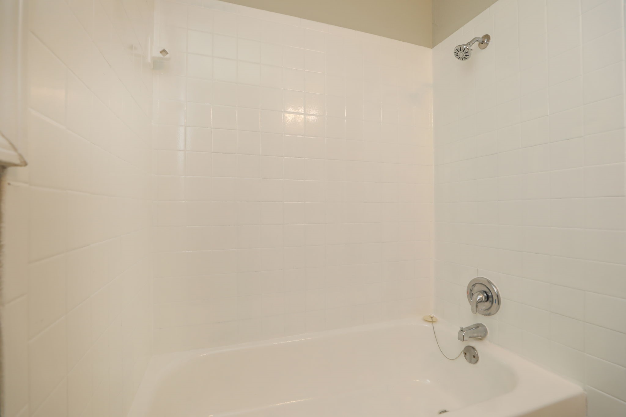 718 Champs Street Channelview, TX 77530 - Photo 27 of 31 a bathroom with a bathtub