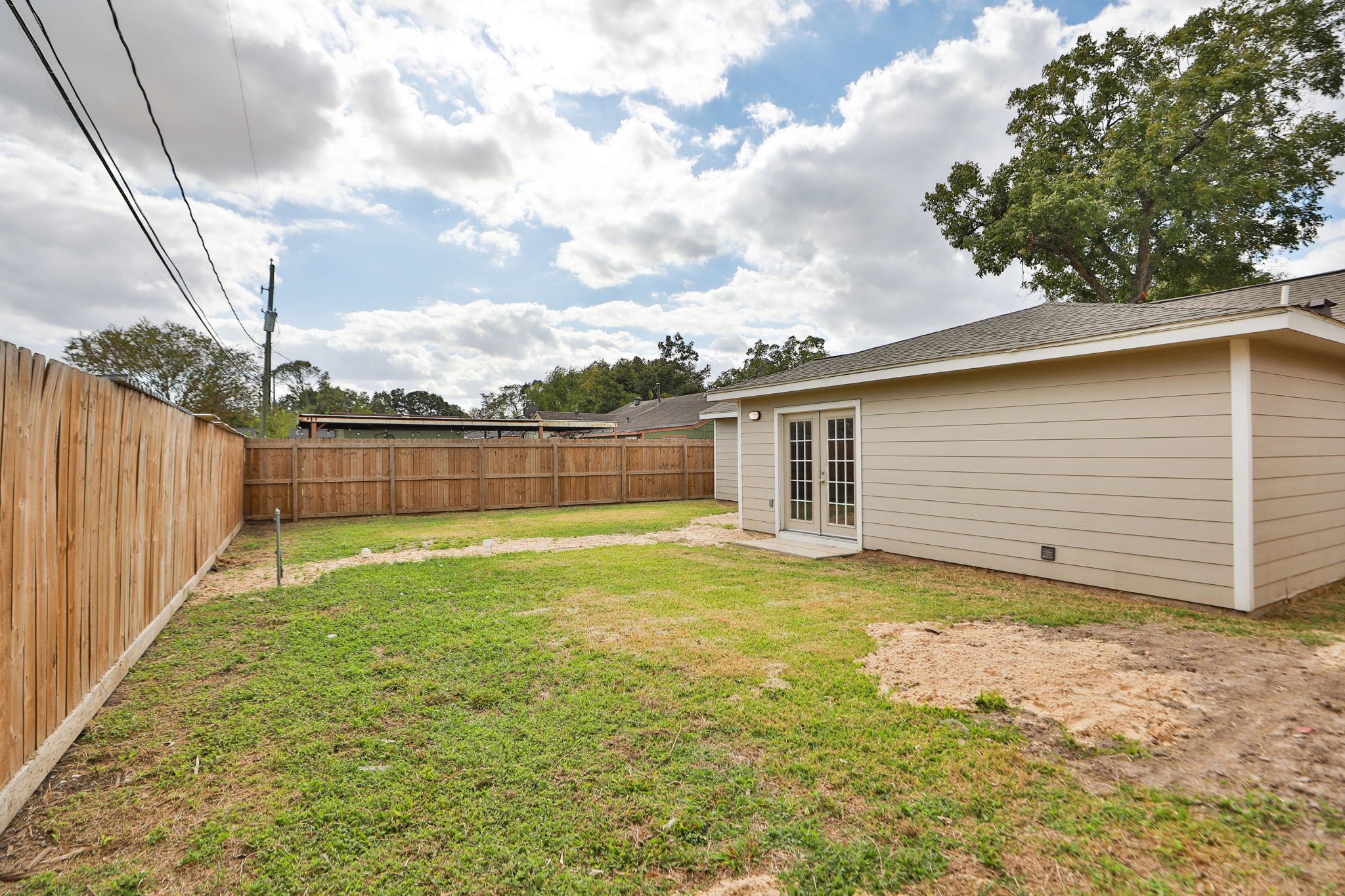 718 Champs Street Channelview, TX 77530 - Photo 29 of 31 a view of a backyard with a garden