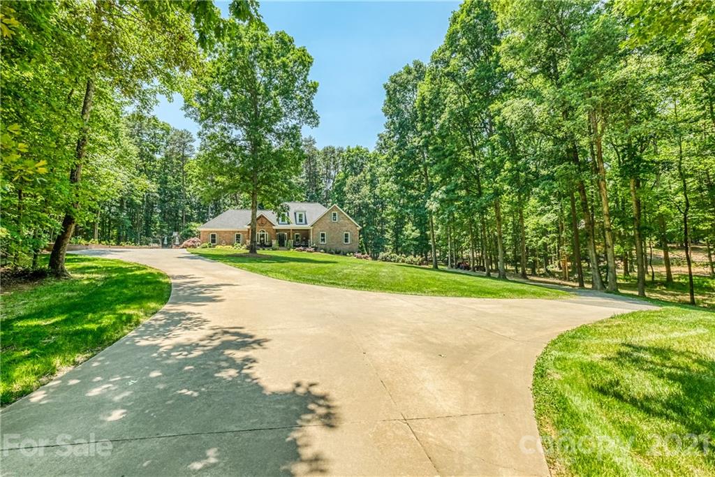 1172 Ben Black Road Midland, NC 28107 - Photo 2 of 48 a view of yard with swimming pool and green space