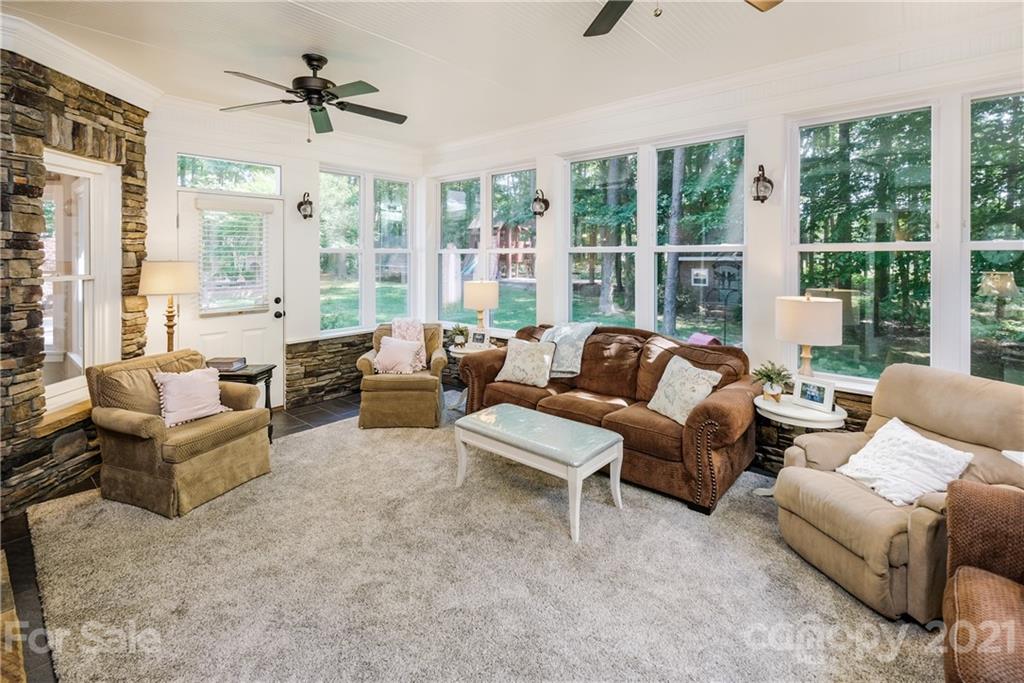 1172 Ben Black Road Midland, NC 28107 - Photo 14 of 48 a living room with furniture and large windows