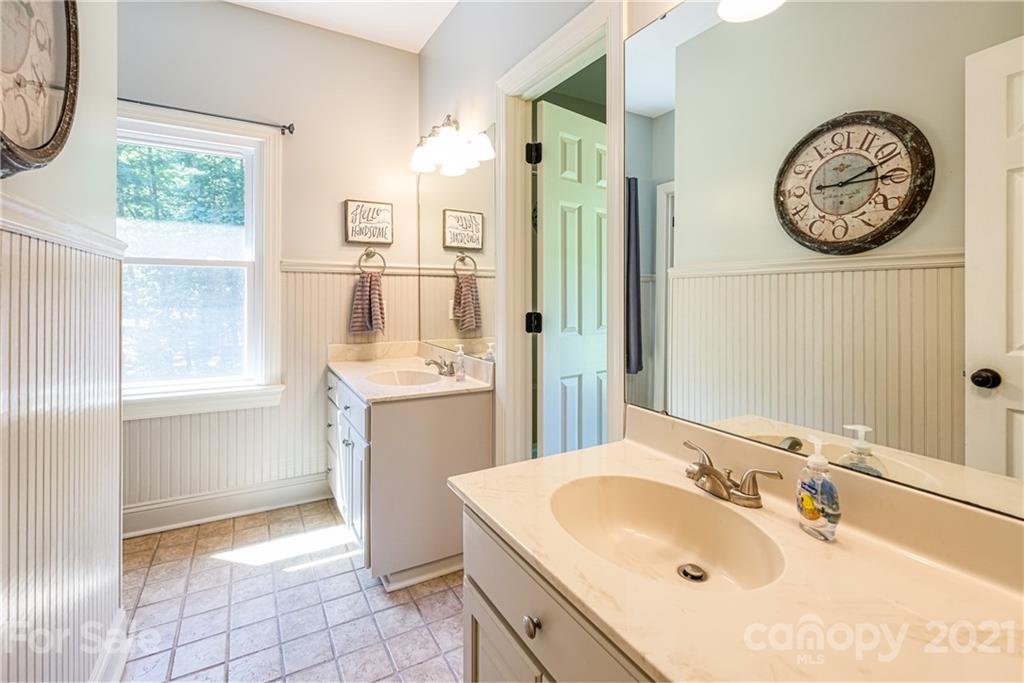 1172 Ben Black Road Midland, NC 28107 - Photo 23 of 48 a bathroom with a sink and a mirror