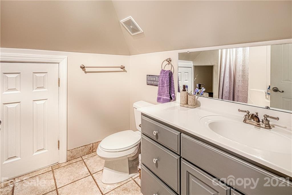 1172 Ben Black Road Midland, NC 28107 - Photo 28 of 48 a bathroom with a sink a toilet and shower
