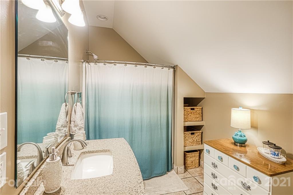 1172 Ben Black Road Midland, NC 28107 - Photo 31 of 48 a bathroom with a granite countertop sink and a mirror