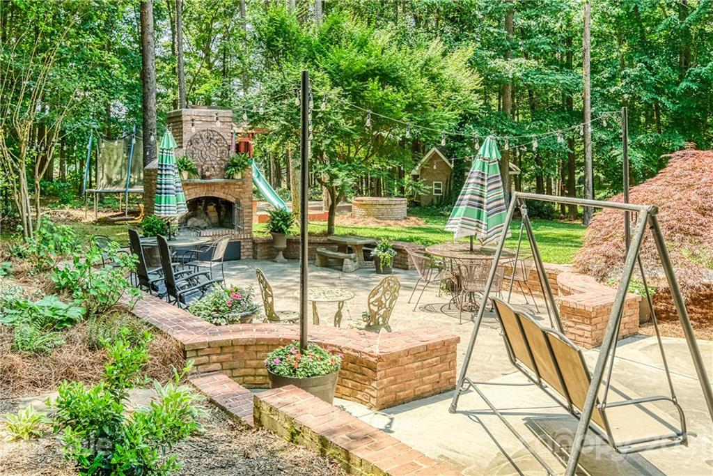 1172 Ben Black Road Midland, NC 28107 - Photo 38 of 48 a view of a swimming pool with a patio