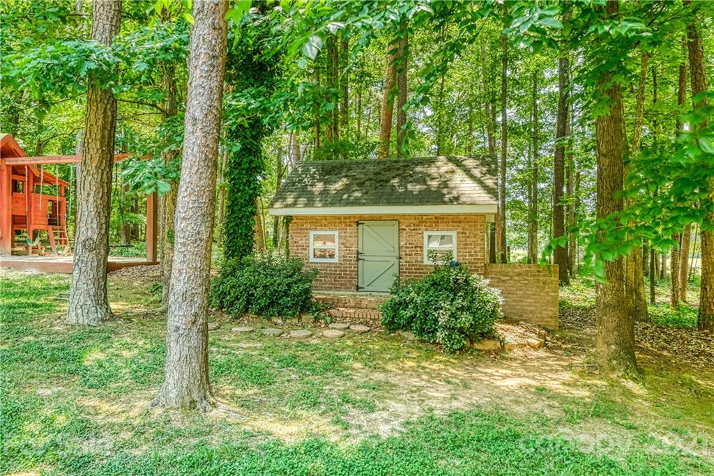 1172 Ben Black Road Midland, NC 28107 - Photo 40 of 48 a view of house with a yard