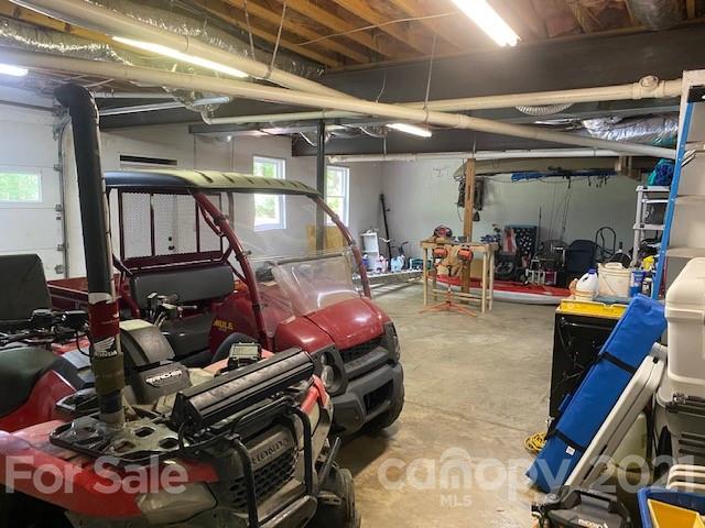 1172 Ben Black Road Midland, NC 28107 - Photo 47 of 48 a room with lots of gym equipment
