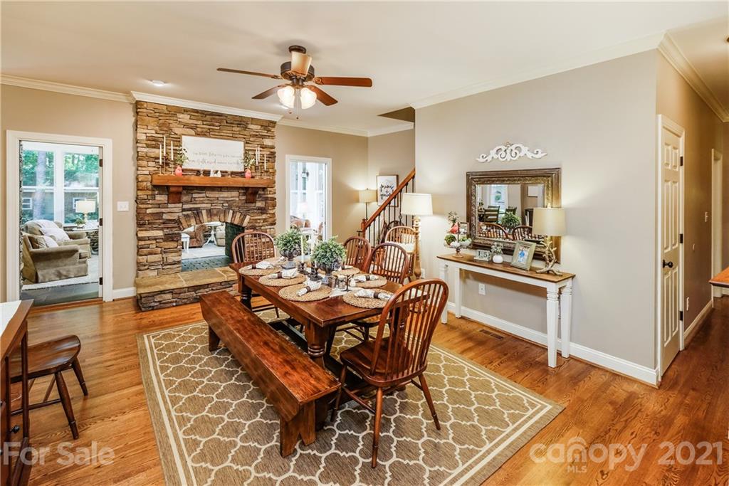 1172 Ben Black Road Midland, NC 28107 - Photo 8 of 48 a living room with furniture a flat screen tv and a table