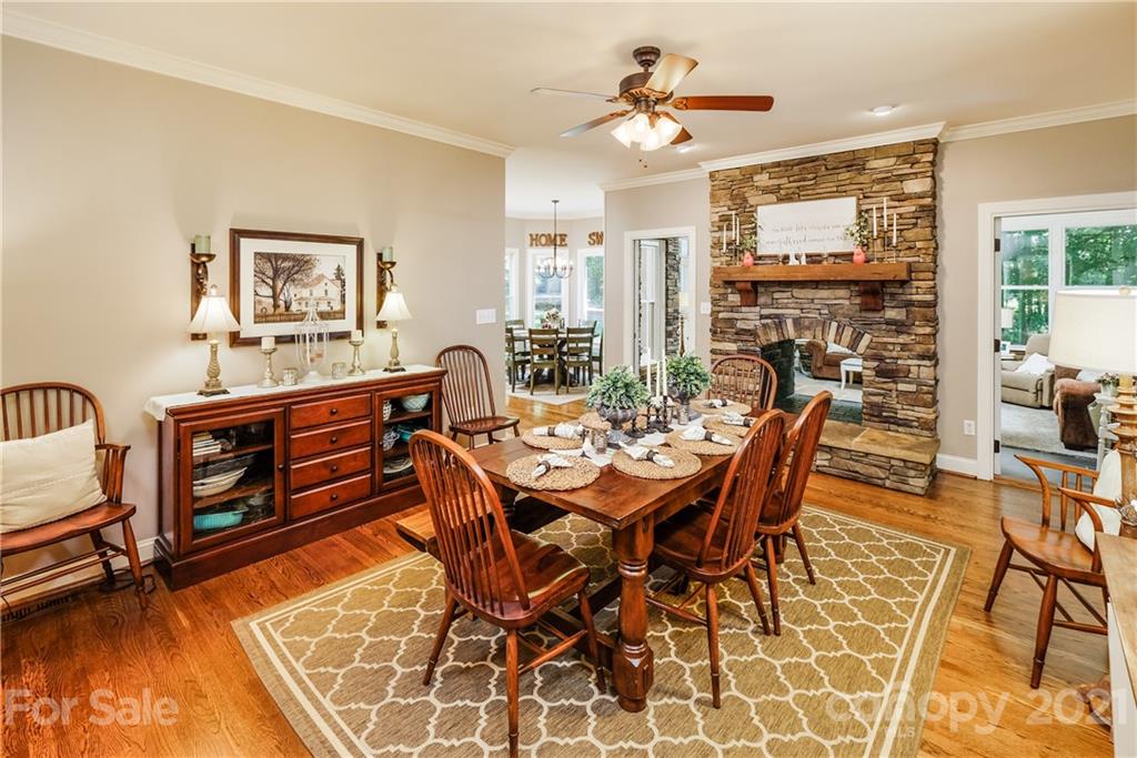 1172 Ben Black Road Midland, NC 28107 - Photo 9 of 48 a view of a dining room with furniture window and wooden floor