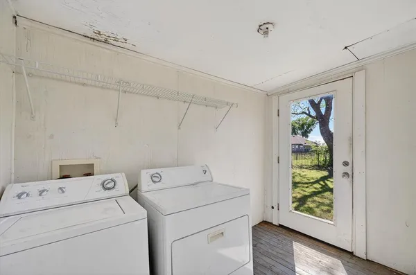 a utility room with dryer and washer