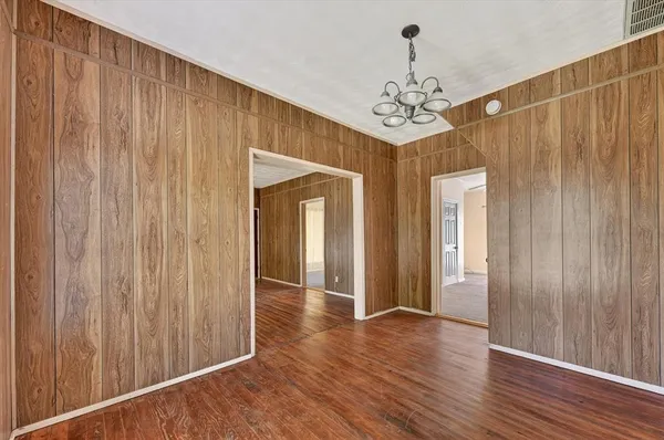 a view of a chandelier in hallway