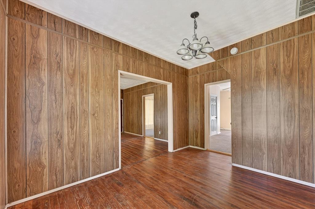 800 South Jefferson Street Pilot Point, TX 76258 - Photo 4 of 27 a view of a chandelier in hallway