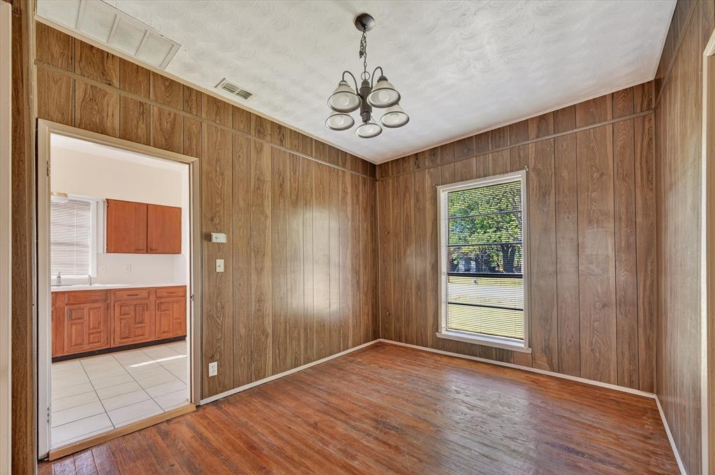 800 South Jefferson Street Pilot Point, TX 76258 - Photo 5 of 27 a view of an entryway with wooden floor