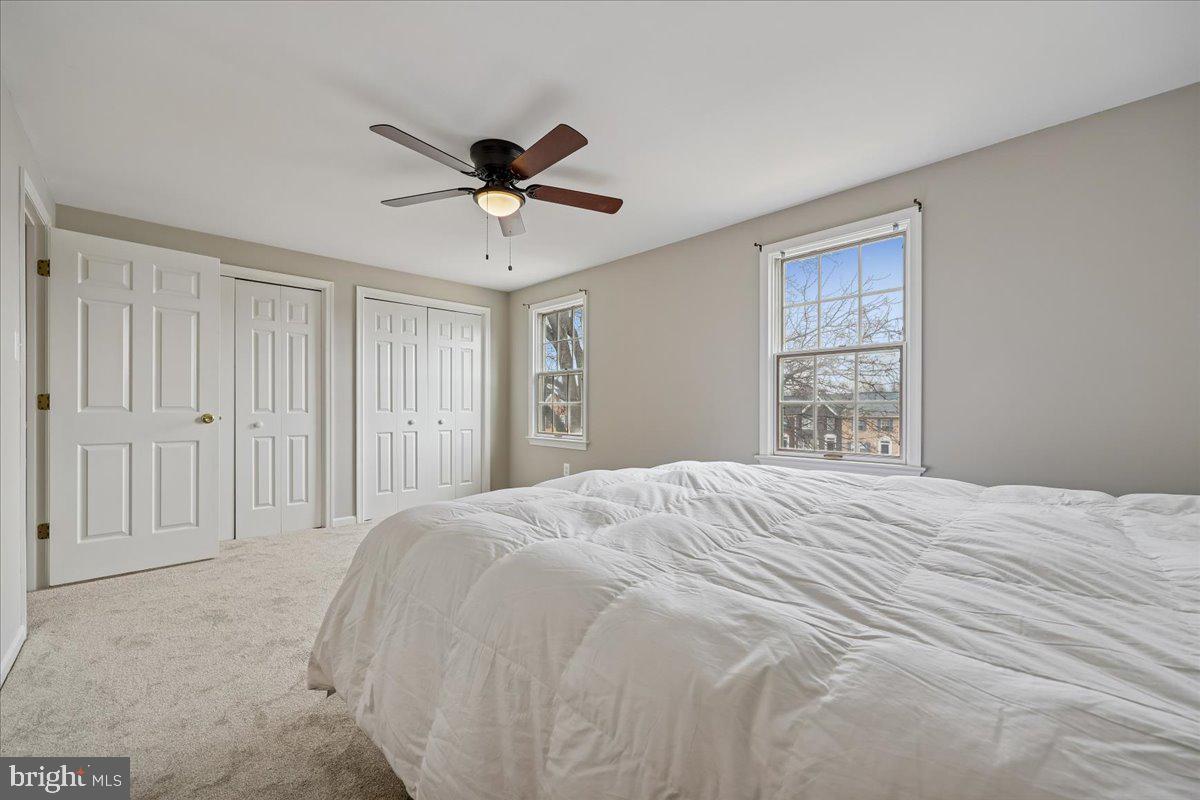 8024 Waterview Court Frederick, MD 21701 - Photo 18 of 72 a bedroom with a bed and a window