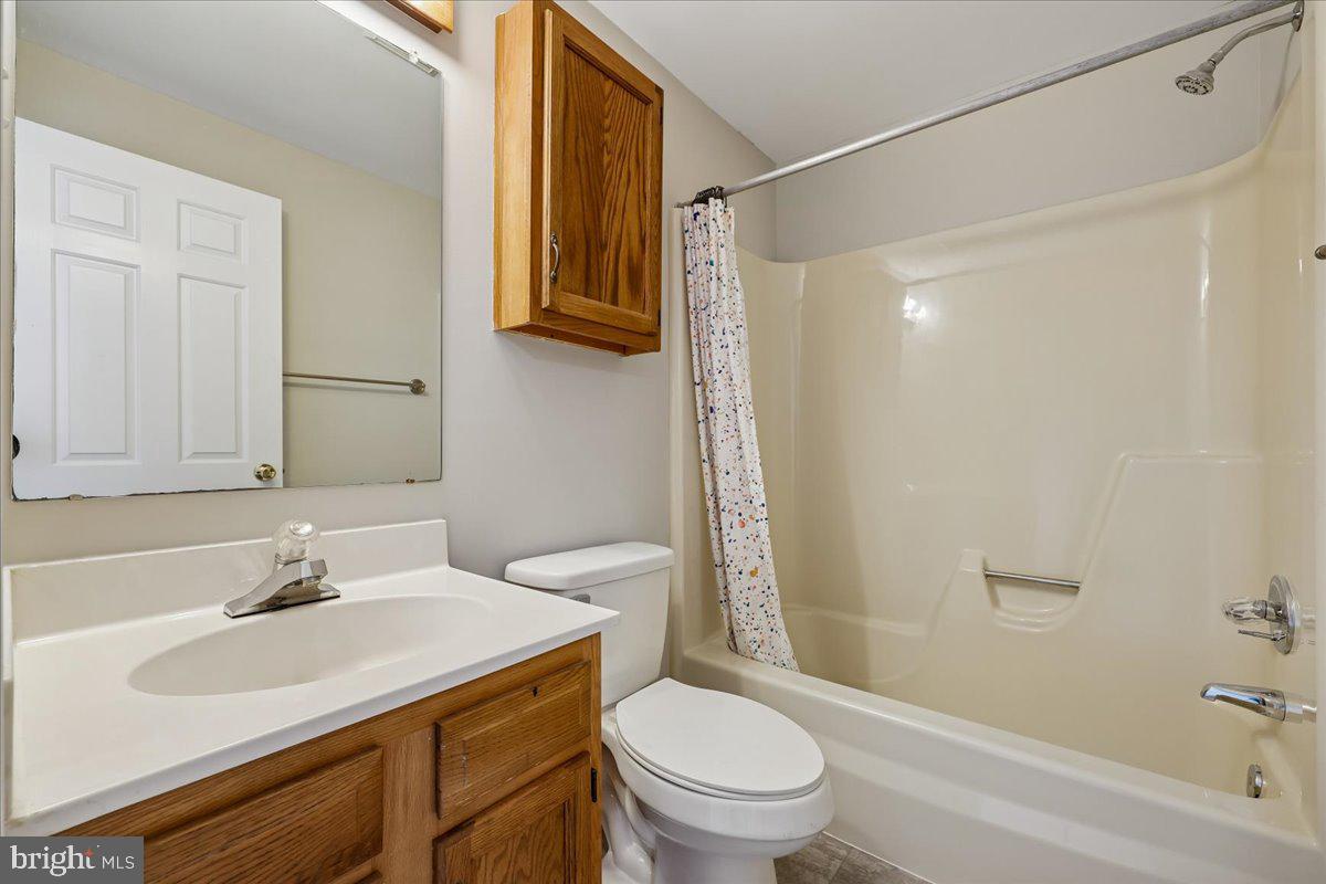 8024 Waterview Court Frederick, MD 21701 - Photo 26 of 72 a bathroom with a sink toilet and shower