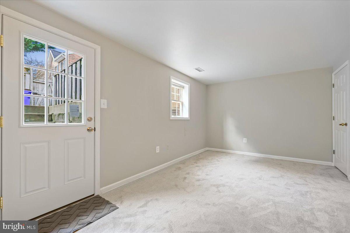8024 Waterview Court Frederick, MD 21701 - Photo 36 of 72 an empty room with windows
