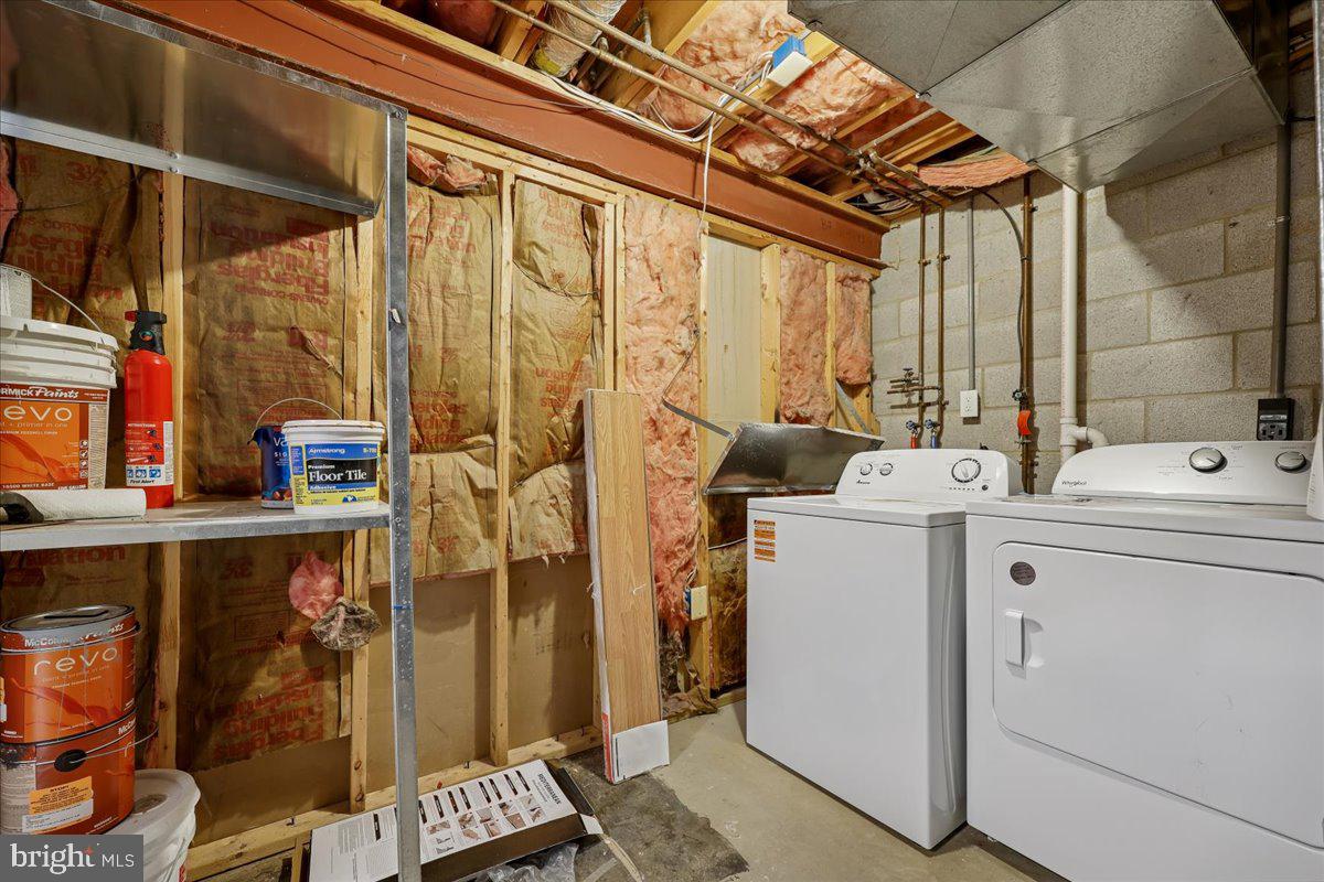 8024 Waterview Court Frederick, MD 21701 - Photo 40 of 72 a utility room with dryer and washer