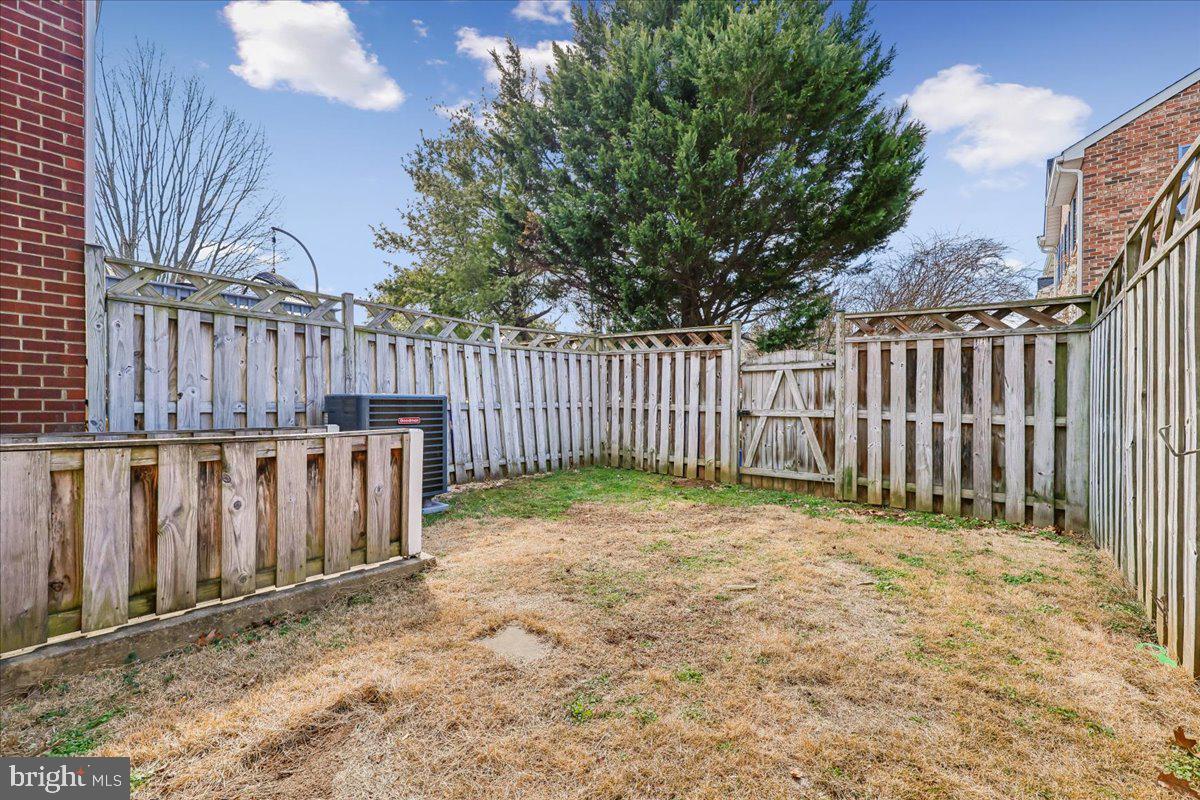 8024 Waterview Court Frederick, MD 21701 - Photo 42 of 72 a view of small yard with wooden fence