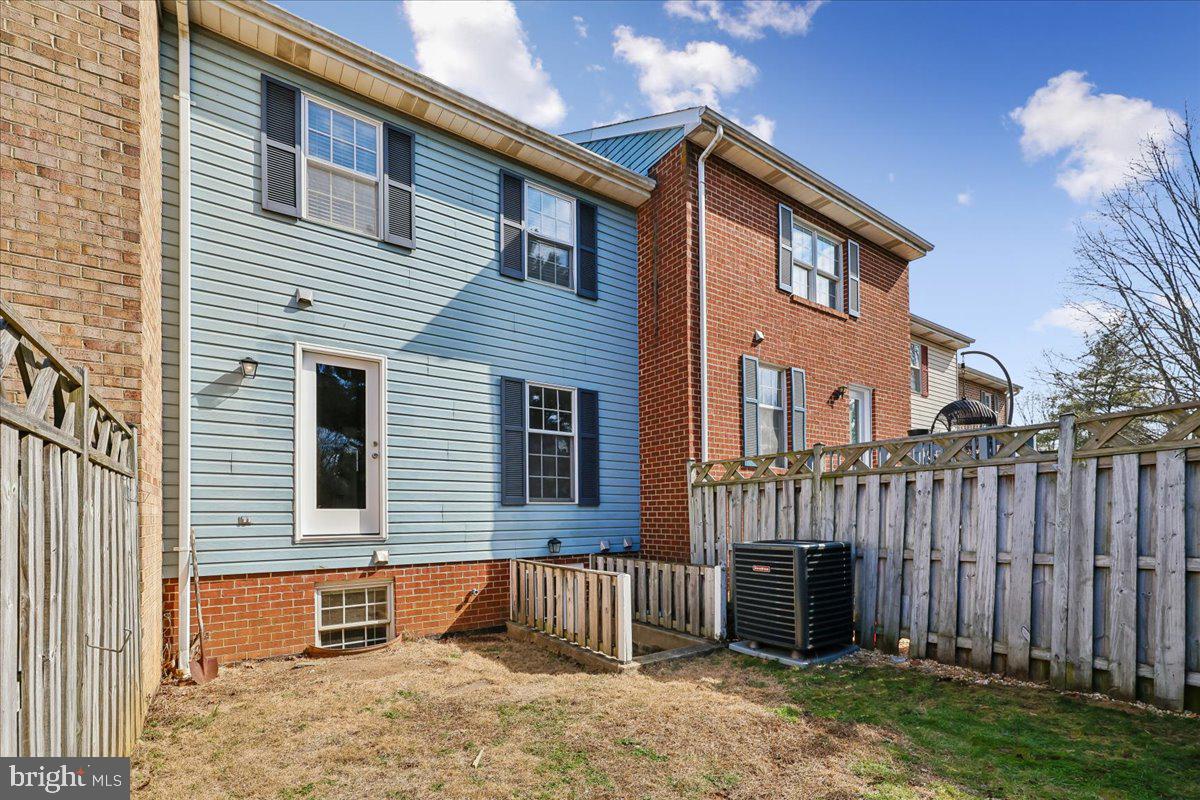 8024 Waterview Court Frederick, MD 21701 - Photo 45 of 72 a view of a house with a backyard and furniture