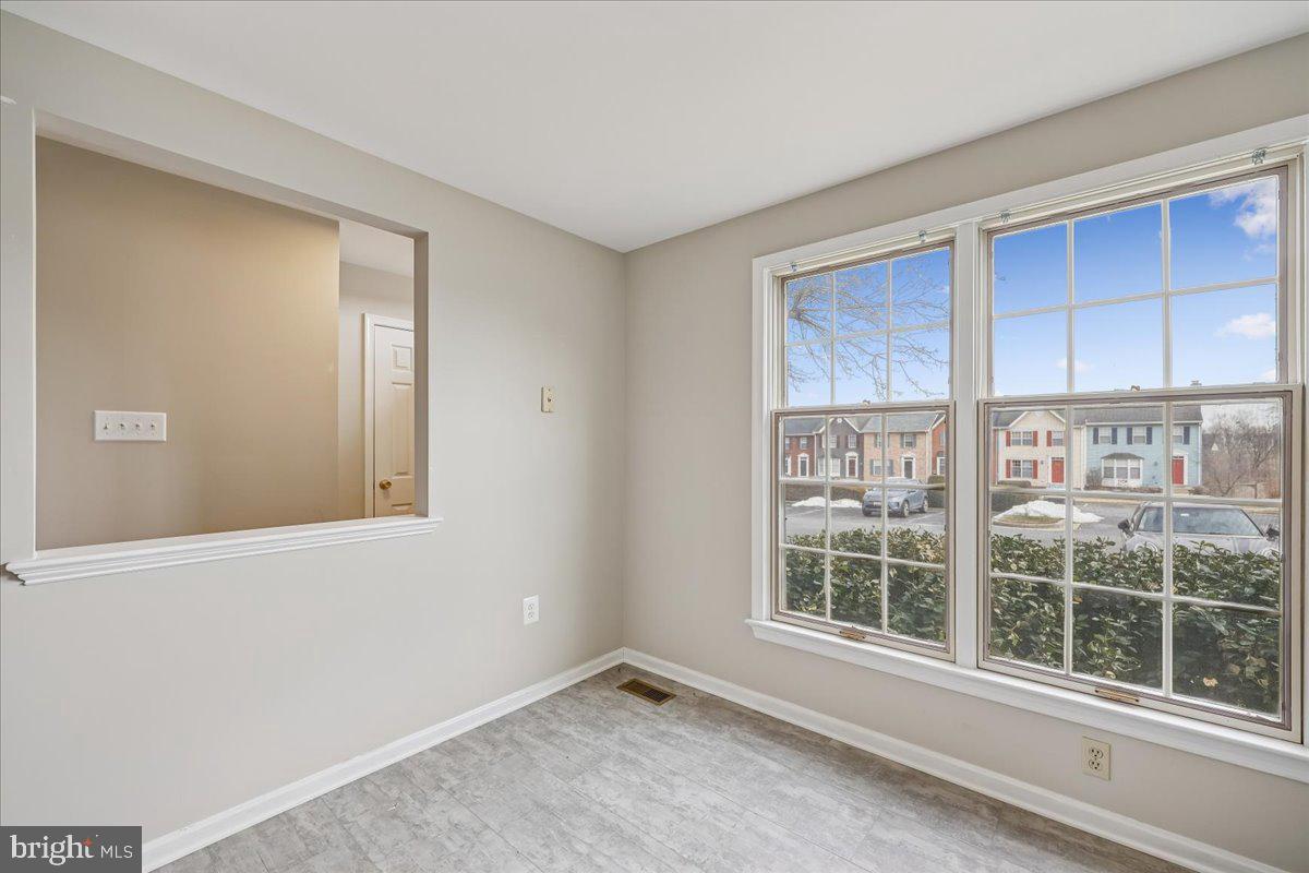 8024 Waterview Court Frederick, MD 21701 - Photo 5 of 72 a view of an empty room with a window