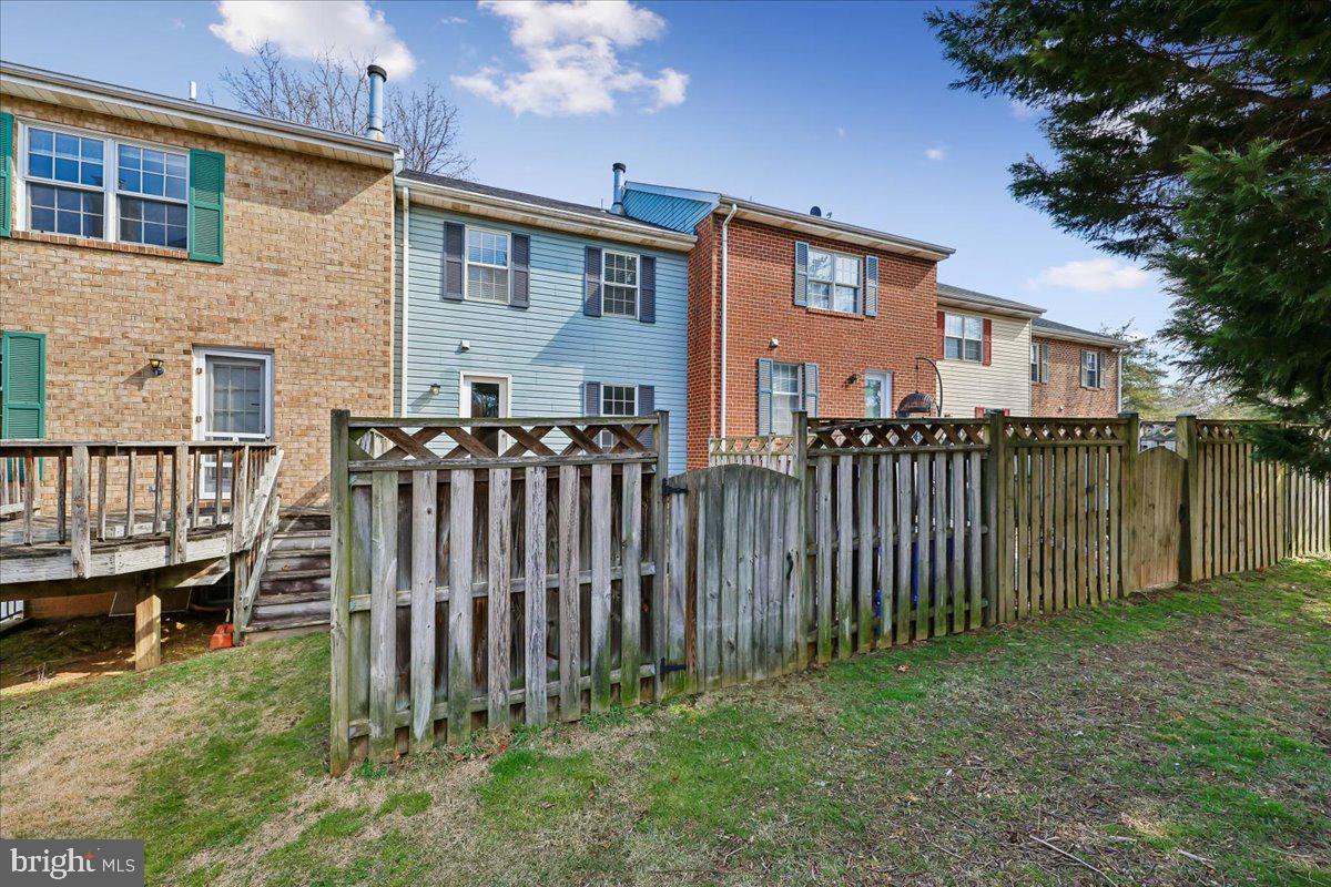 8024 Waterview Court Frederick, MD 21701 - Photo 51 of 72 a view of a house with wooden fence