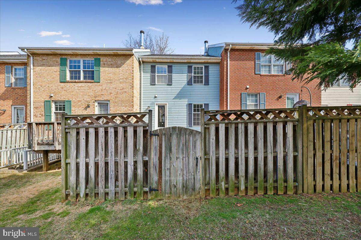 8024 Waterview Court Frederick, MD 21701 - Photo 52 of 72 a front view of a house with a garden