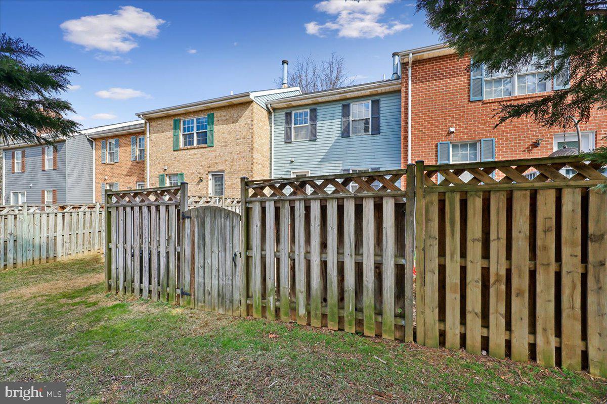 8024 Waterview Court Frederick, MD 21701 - Photo 53 of 72 a front view of a house with a garden
