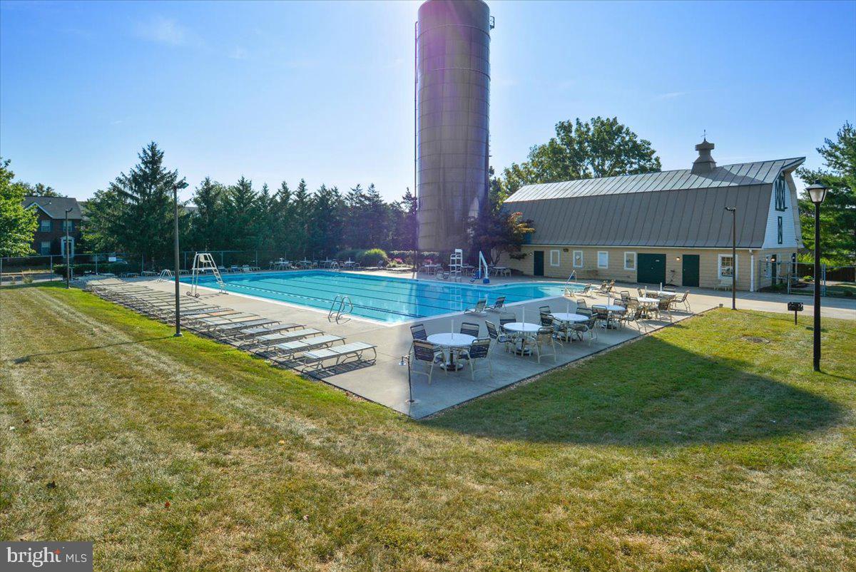 8024 Waterview Court Frederick, MD 21701 - Photo 56 of 72 a view of a backyard with sitting area