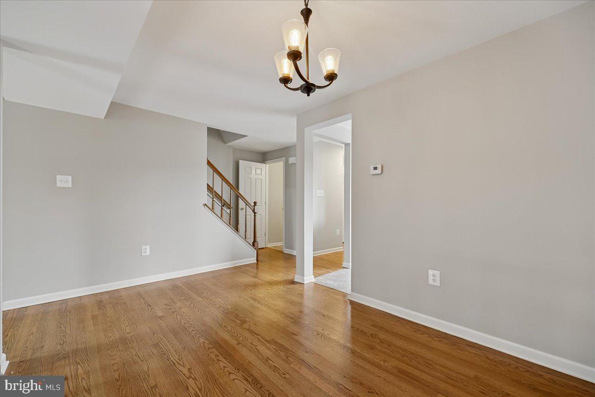 8024 Waterview Court Frederick, MD 21701 - Photo 10 of 72 a view of an entryway with wooden floor